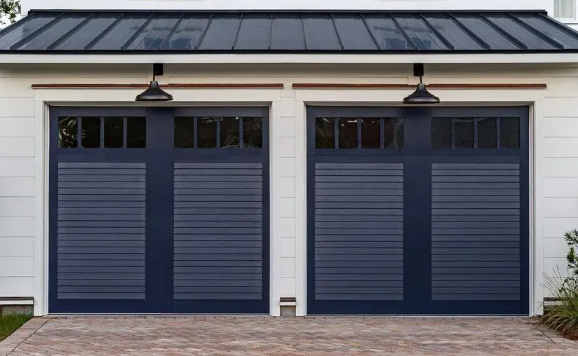Garage doors with lights above.