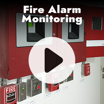 Fire alarm control panel and pull stations. Red panel and boxes with a play button overlay.