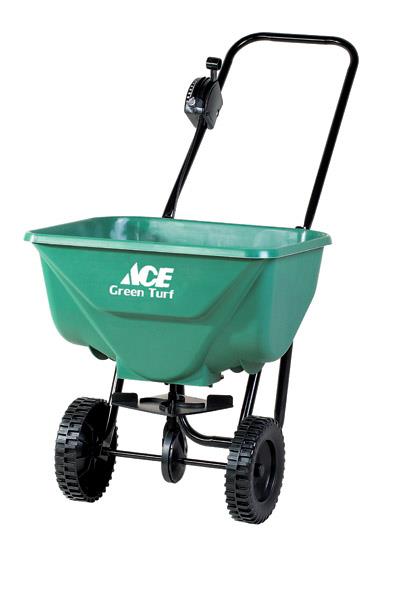 A green wheelbarrow with the word ace on it