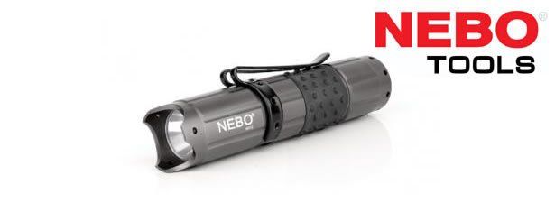 A nero tools flashlight is sitting on a white surface.