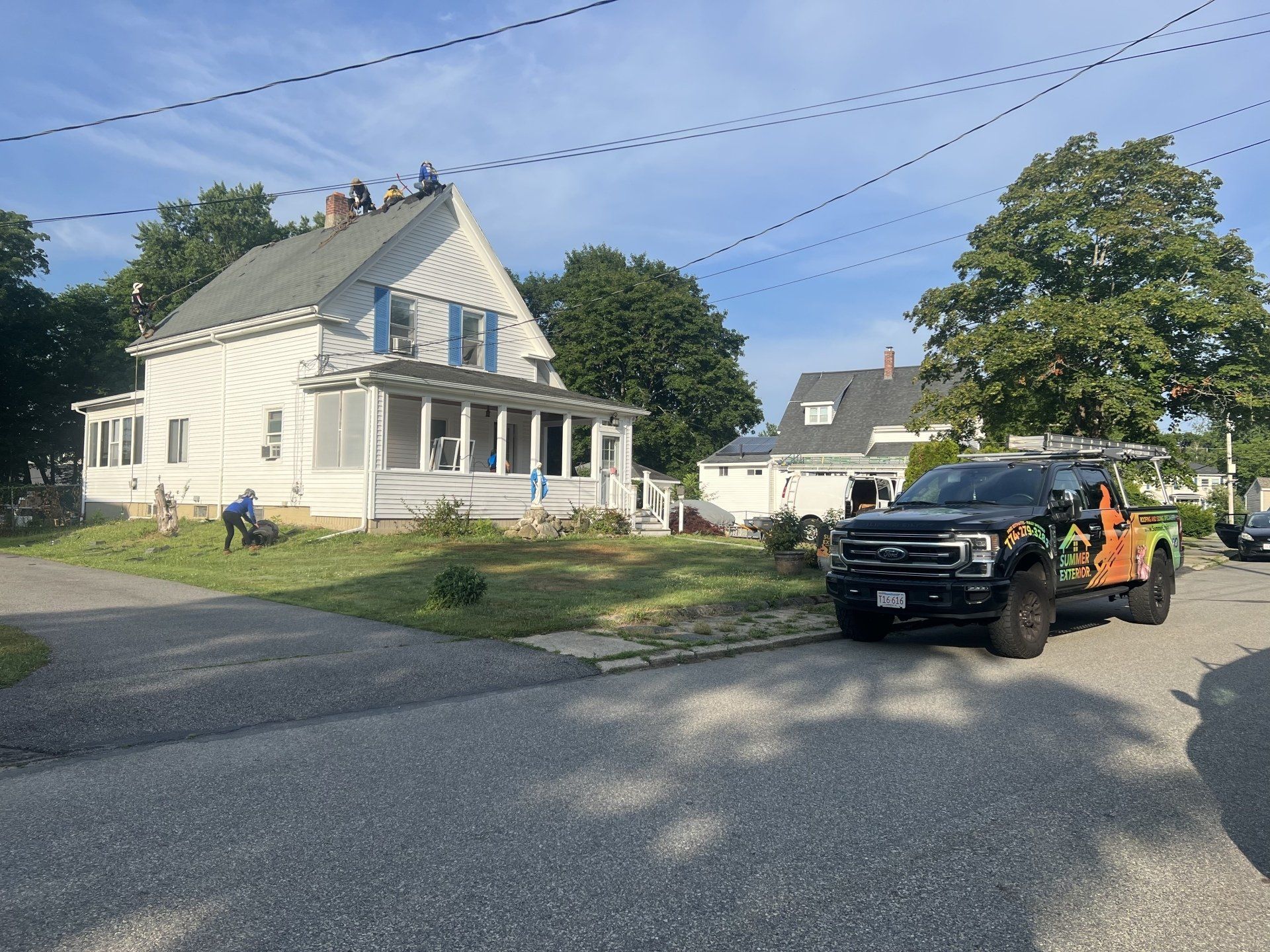 Service truck in front of a residential house