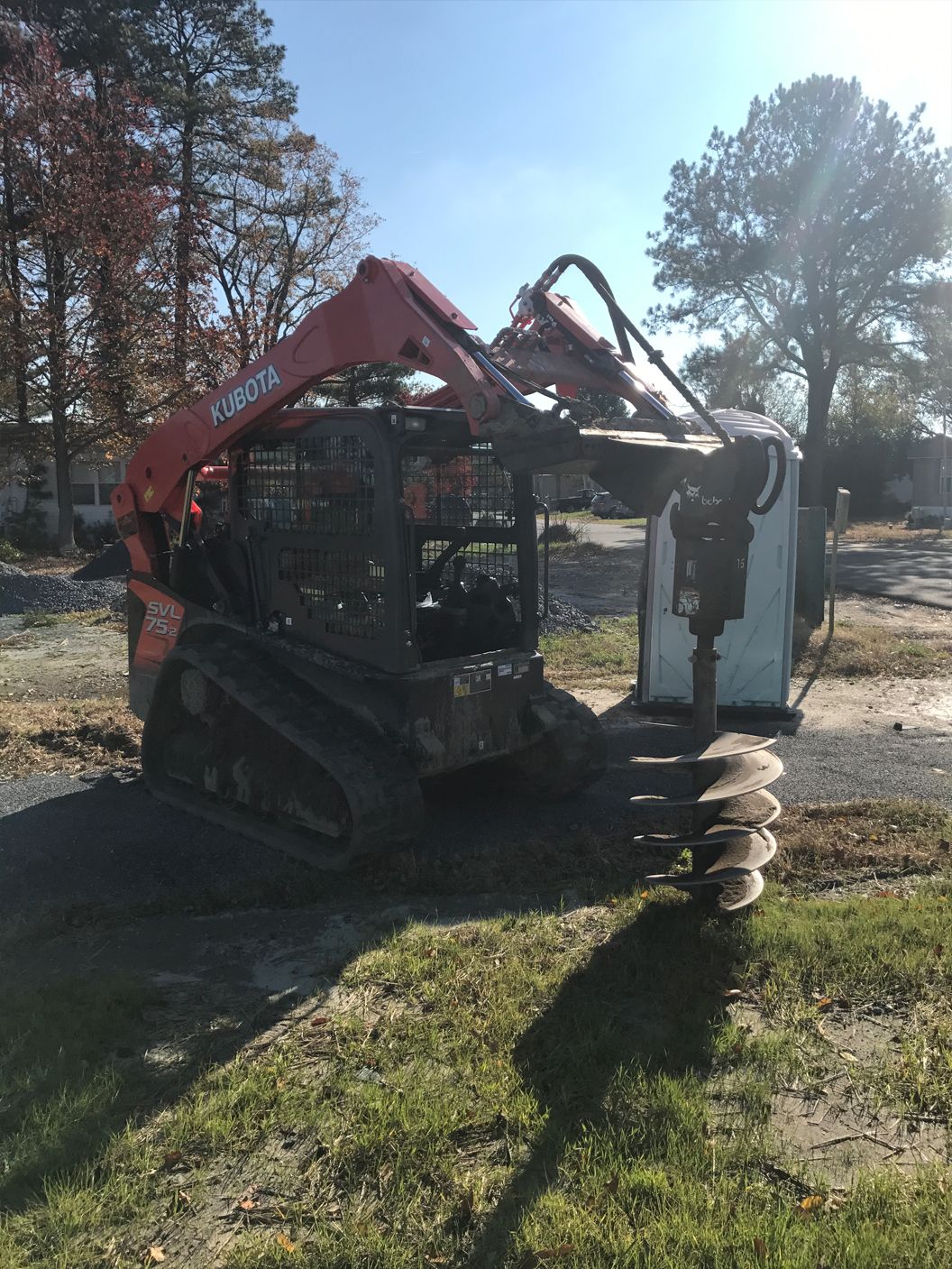 A bulldozer is digging a hole in the ground.