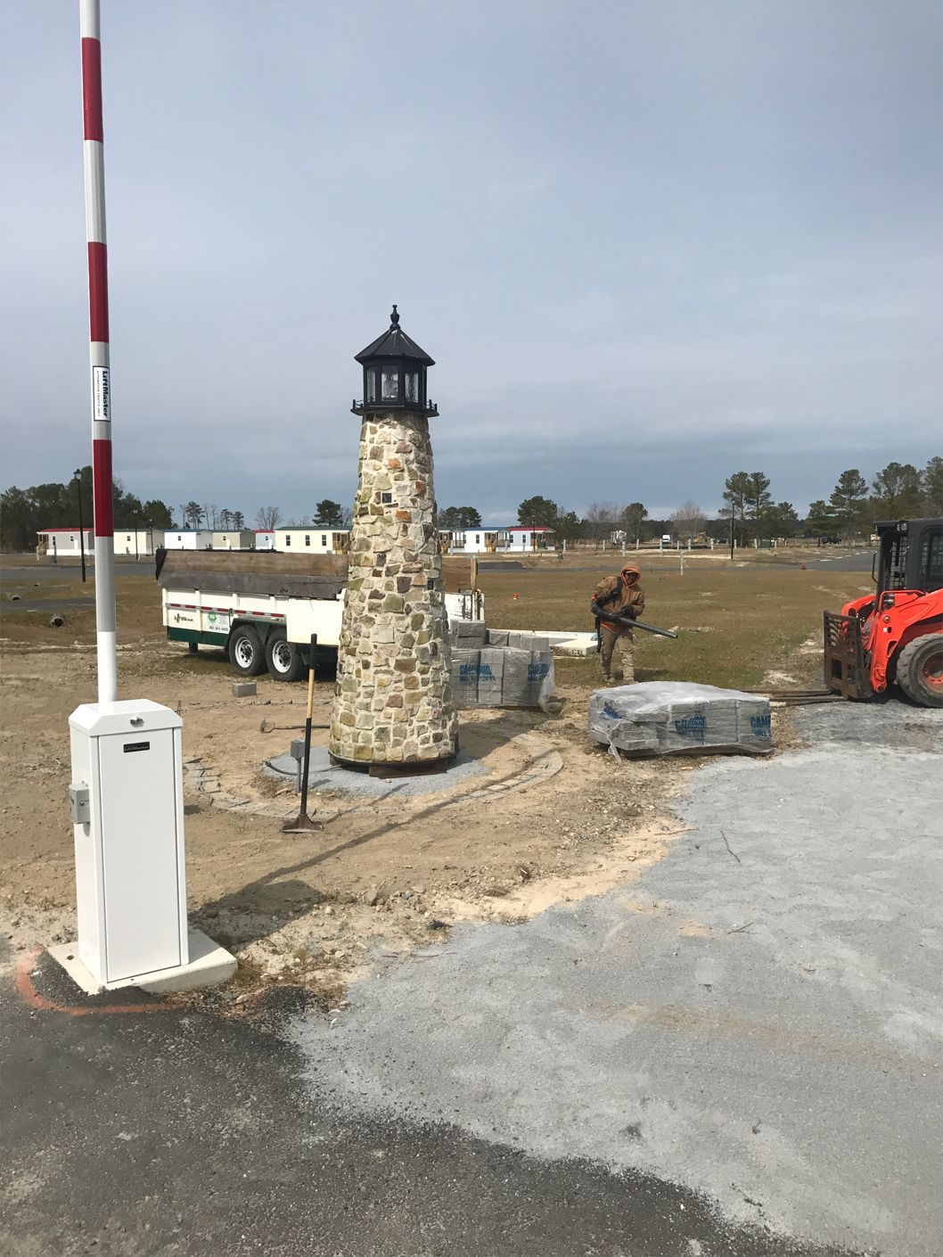 A lighthouse is being built on the side of the road