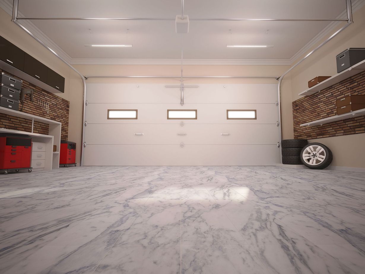 Empty attic room with sloped ceiling, dark wood floors, recessed lights, and a brown door