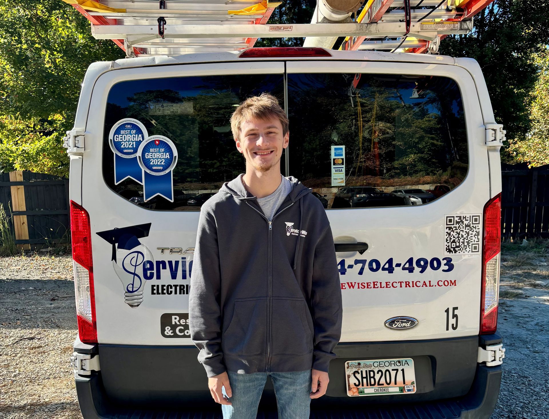 Man standing in front of a service van with 