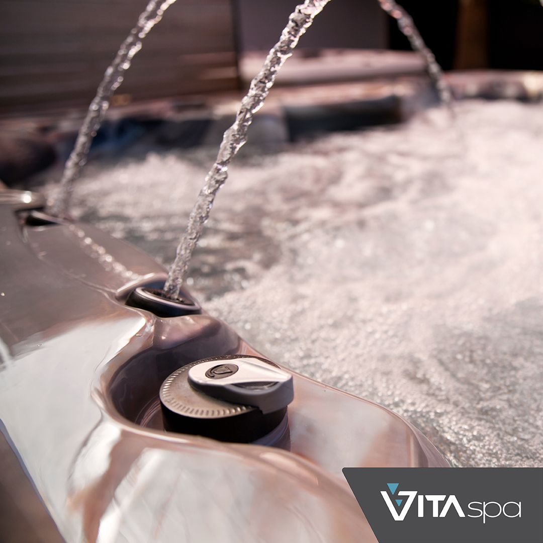Close-up of a hot tub with water jets, creating a relaxing ambiance.