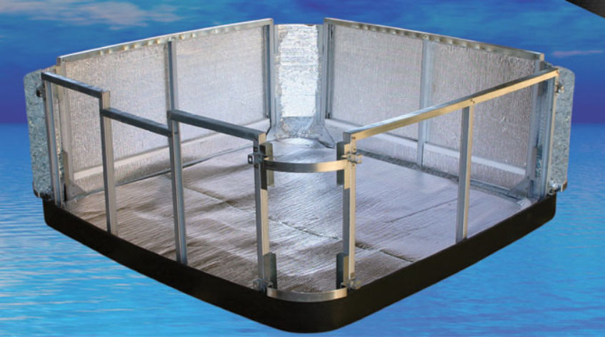 Square metal barrier on water, with a gray fence and dark base.