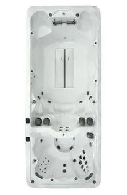 Top-down view of a long, white swim spa with multiple seating areas and jet placements.