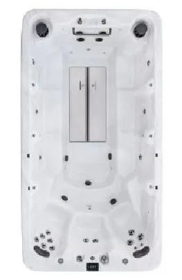 Overhead view of a white rectangular swim spa with jet nozzles, seating, and a central divider.