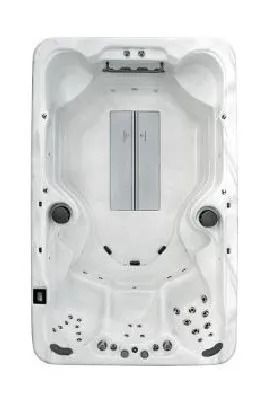 Top-down view of a white rectangular hot tub with molded seating, jets, and a central cabinet.