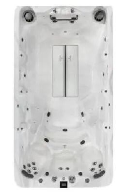 Top-down view of a rectangular, white hot tub with multiple jets and seating areas.