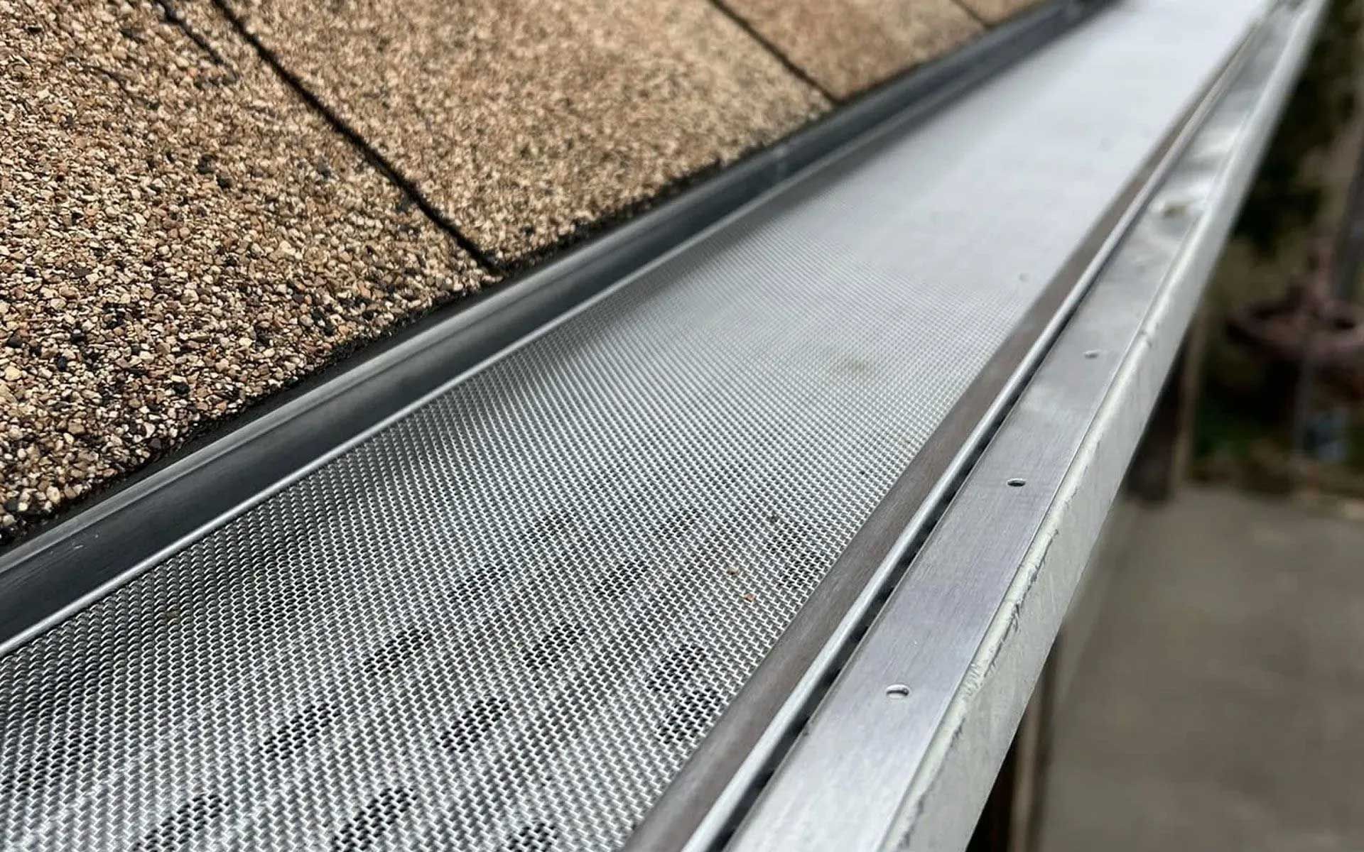 Close-up of a metal roof gutter 