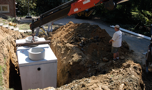 A septic tank being installed.