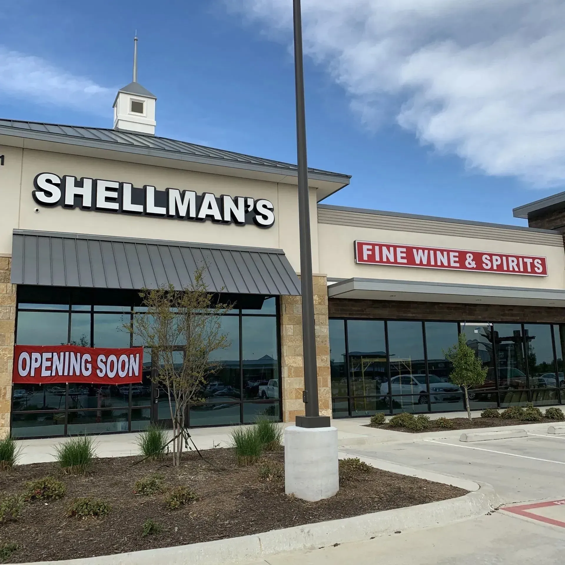 Front lit channel letter building sign installed on shape cut backer with front lit cabinet signs in Lantana, TX