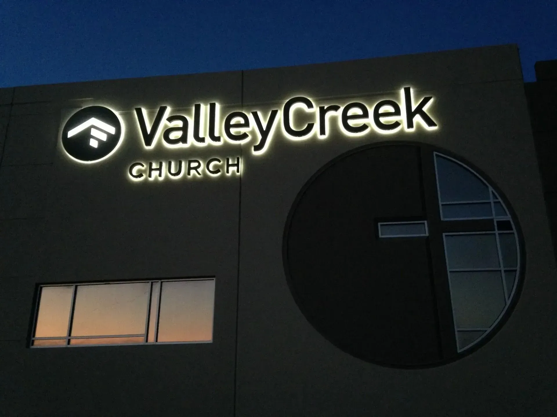 Illuminated reverse lit channel letter building sign at Valley Creek Church in Flower Mound, TX