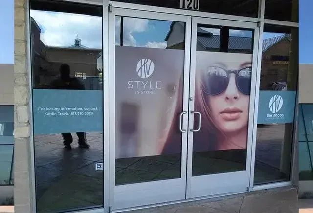Digitally printed storefront vinyl graphics installed at the Shops at Highland Village