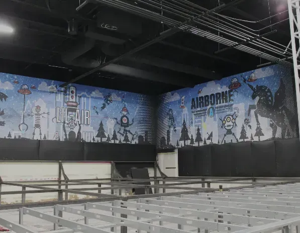 Digitally printed wall mural installed at Airborne Trampoline Park in North Richland Hills, TX