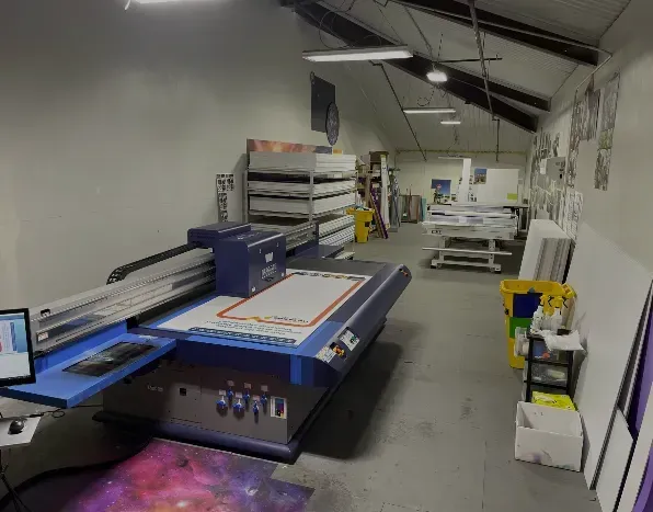 5x10 Vanguard flatbed UV large format printer in print production room at SIGMA Sign Co. in Lewisville, TX