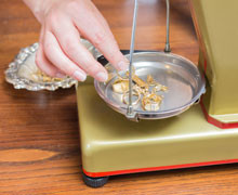 Jewelries being weighed