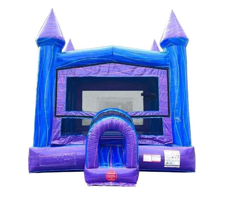 Blue and purple inflatable bounce house with castle design, entrance arch.