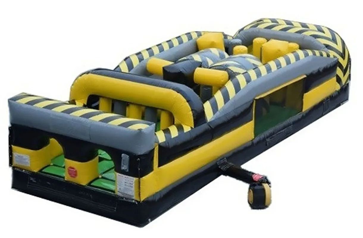 Inflatable obstacle course with yellow and black hazard stripes.