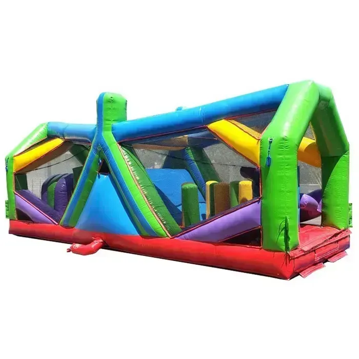 Inflatable obstacle course with colorful sections, including tunnels and slides.
