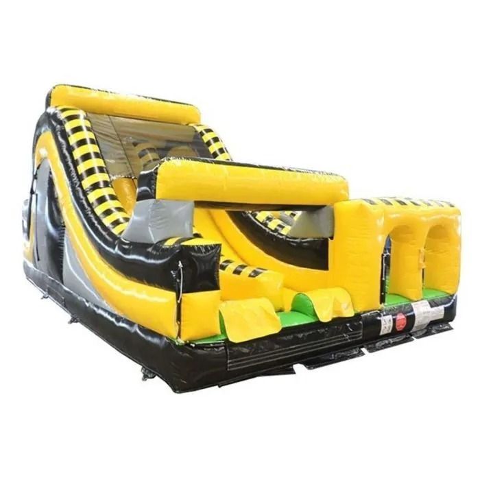 Inflatable yellow, black, and gray construction-themed slide with a climbing wall and tunnel.