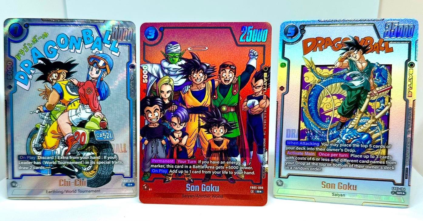Three colorful collectible Dragon Ball card packs displayed side by side on a white background