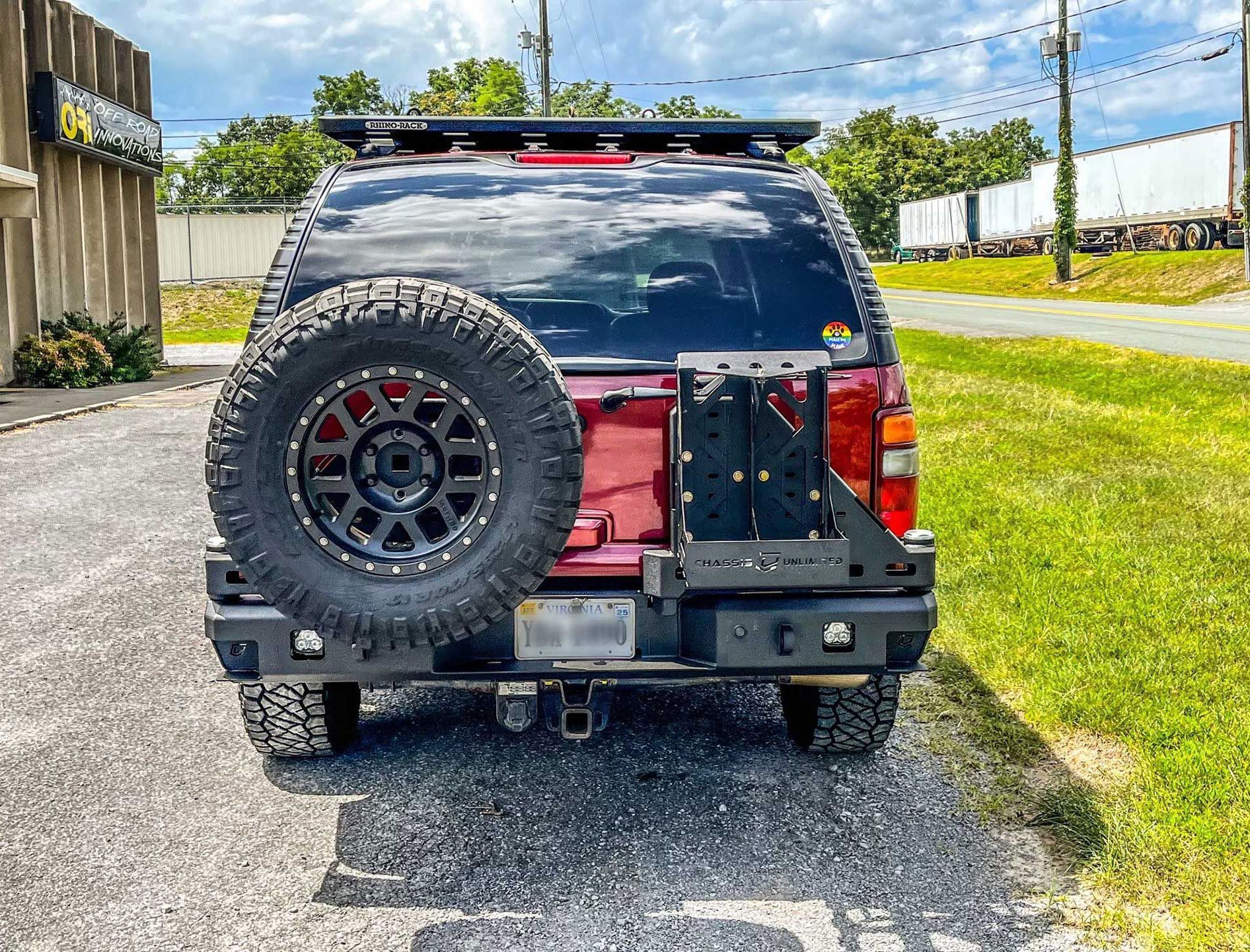 back of red Chevy Tahoe