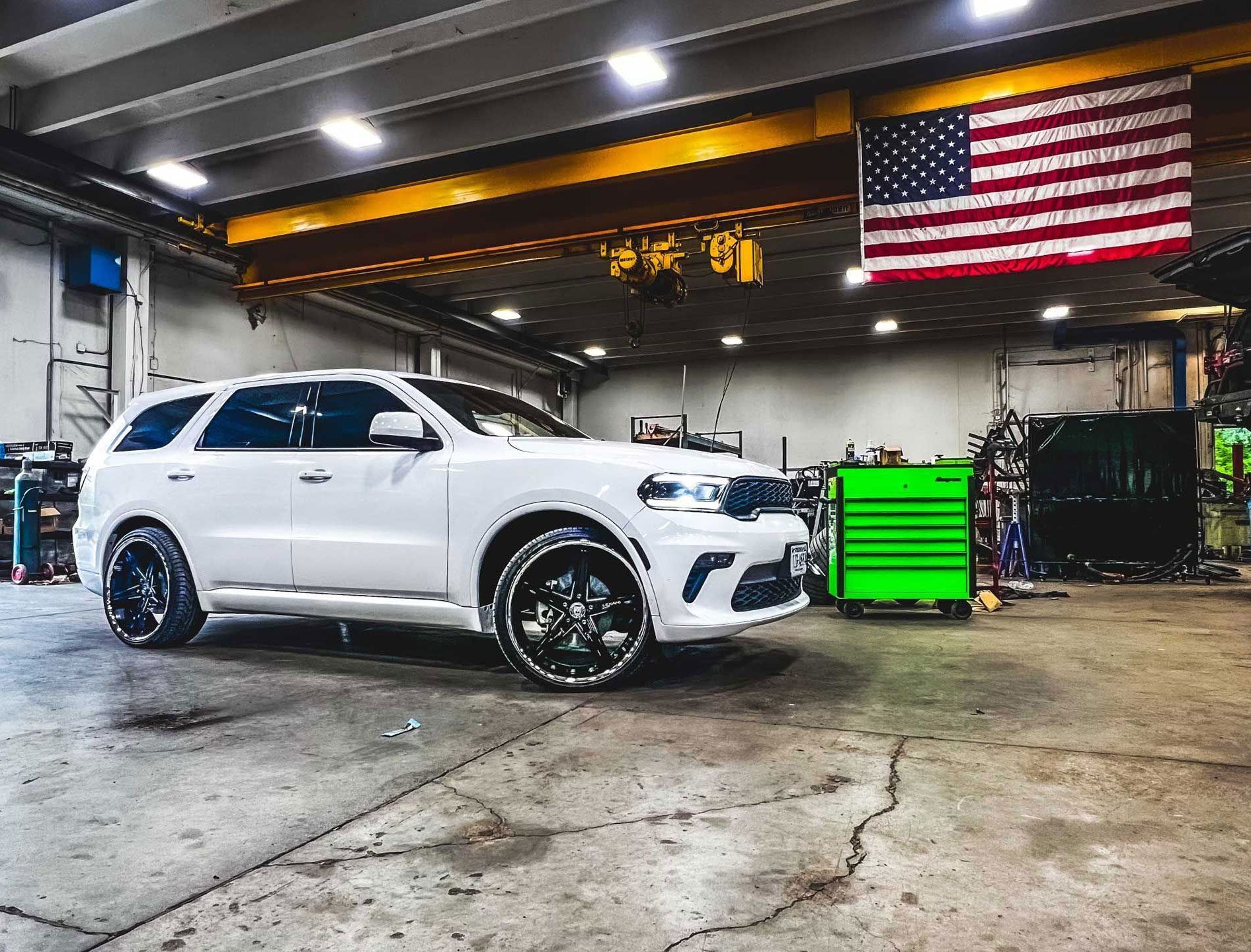 white SUV in the garage