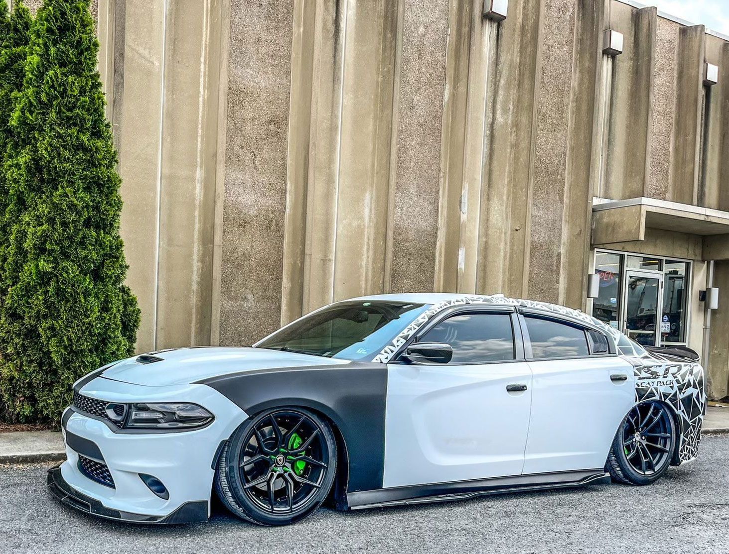 lowered black and white car