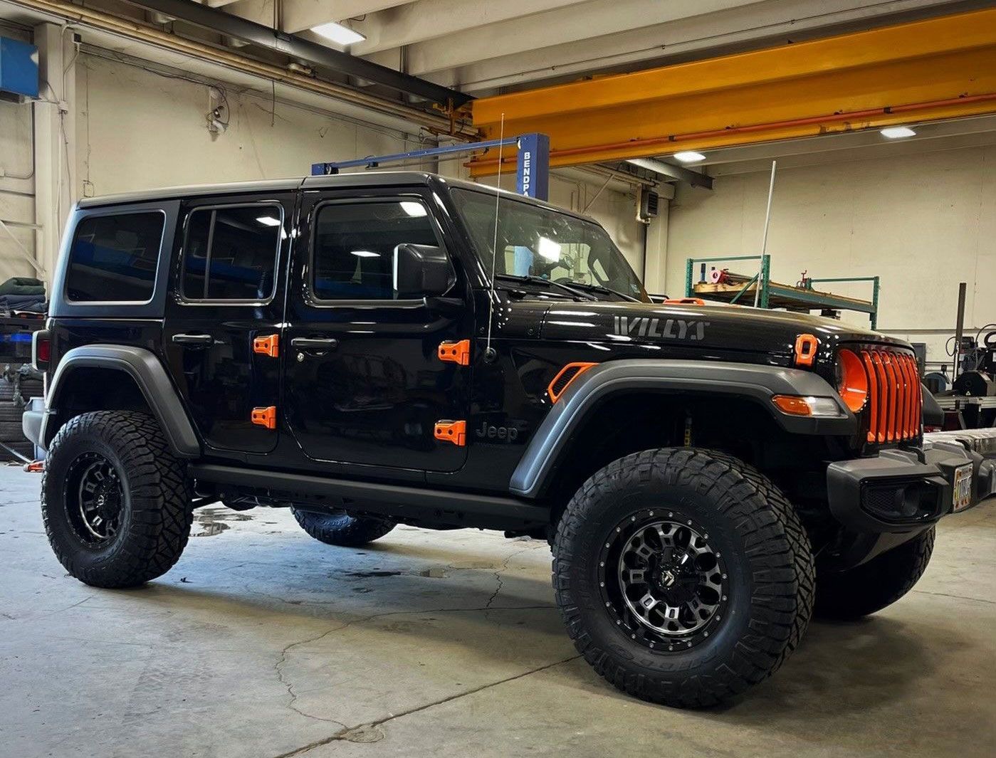 black Jeep Wrangler Willys with orange accents