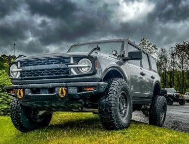 off-road vehicle parked on the grass