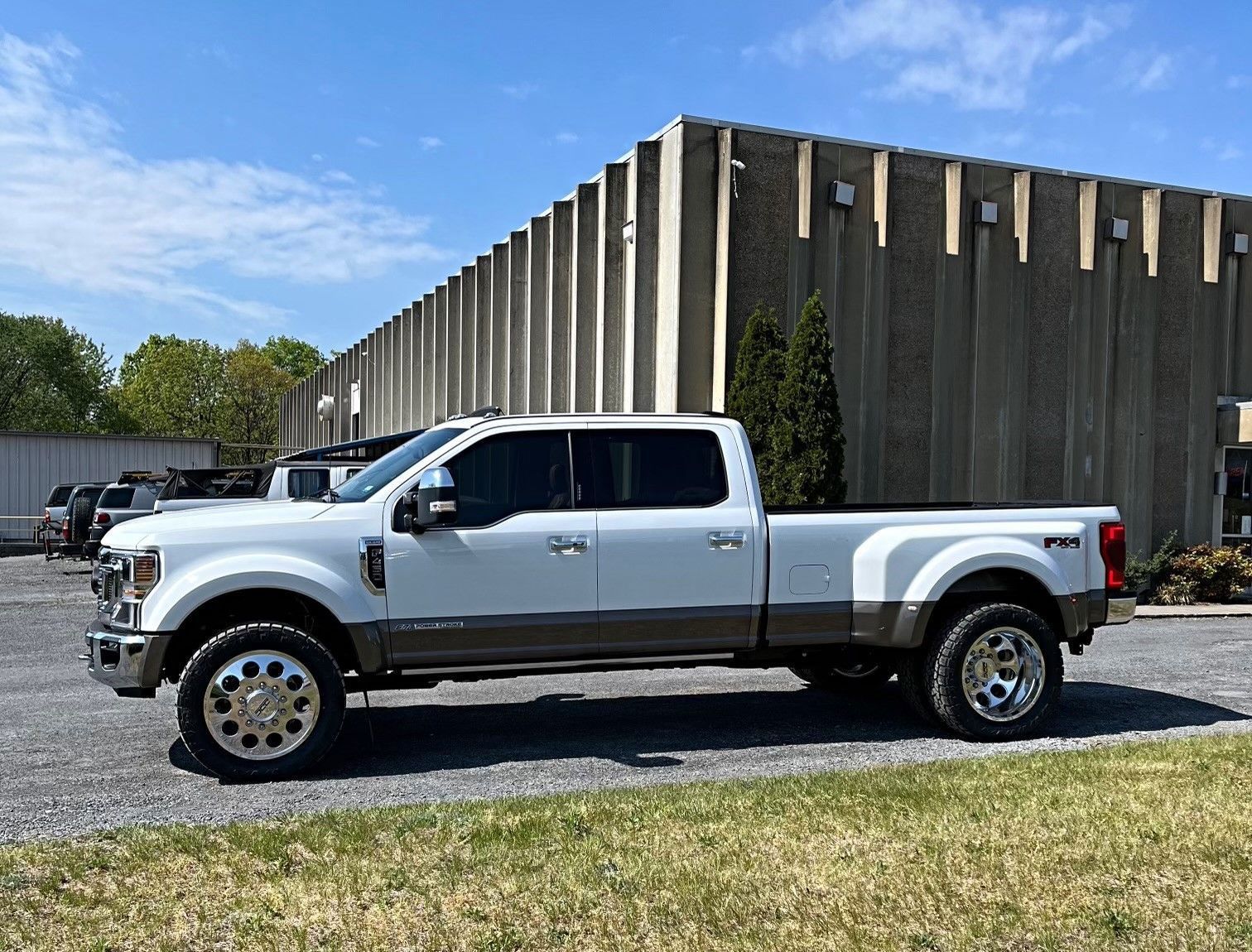 white and brown pickup