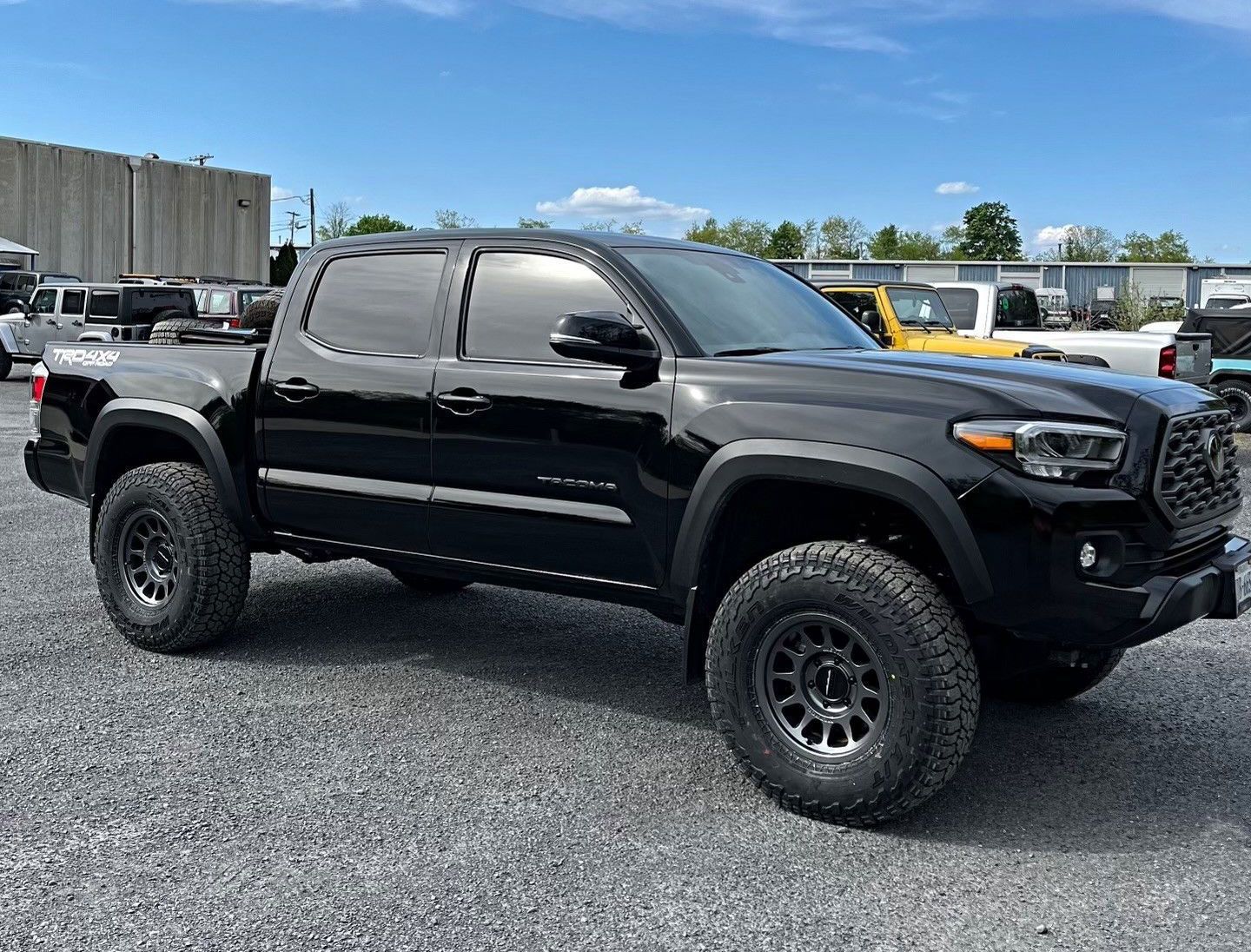 parked black Tacoma