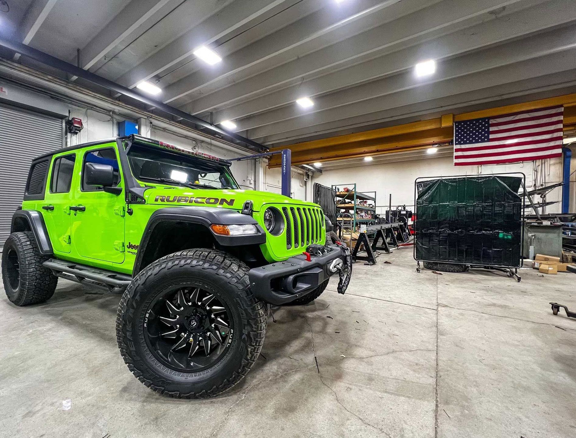 green Jeep Wrangler Rubicon