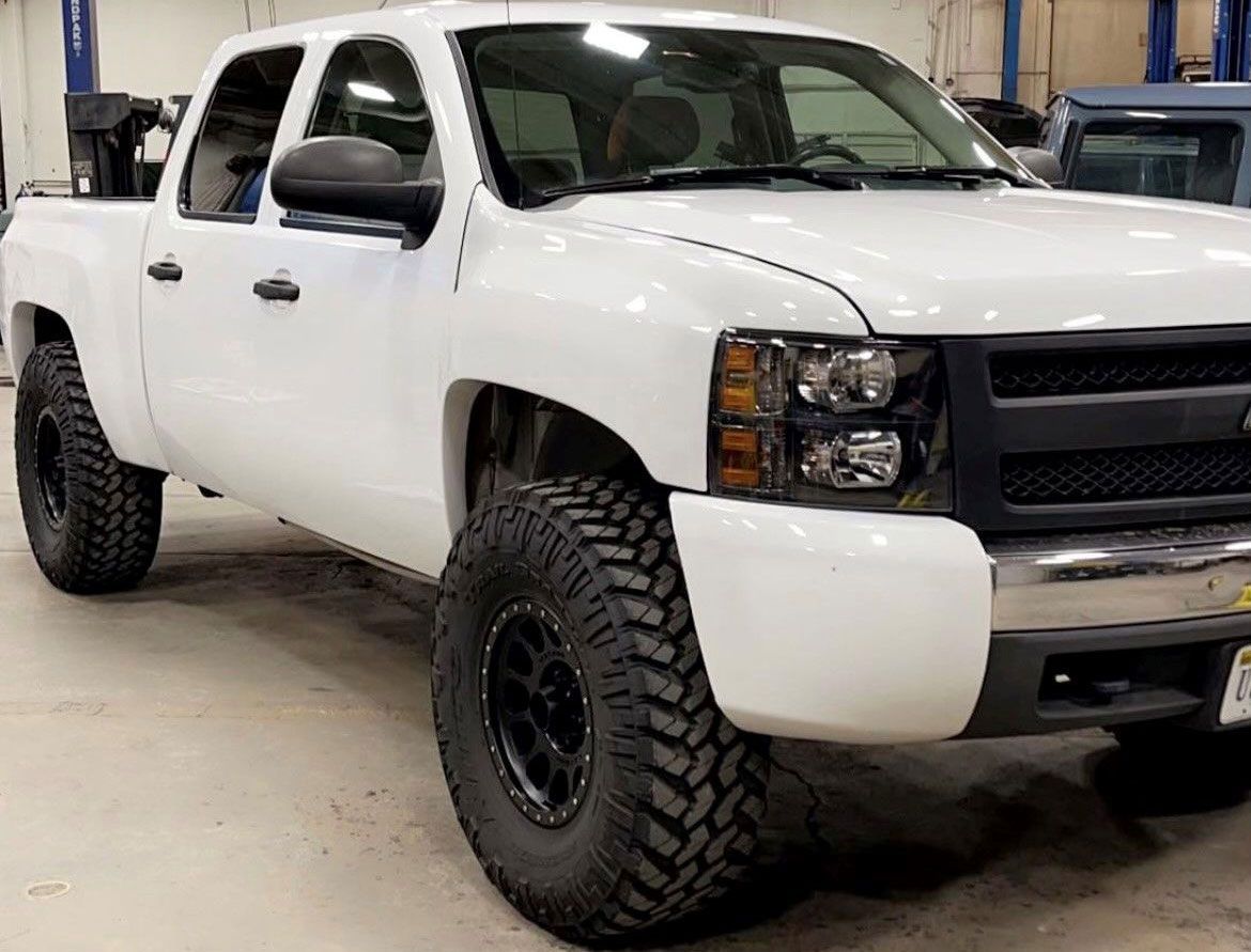white pickup truck in the garage