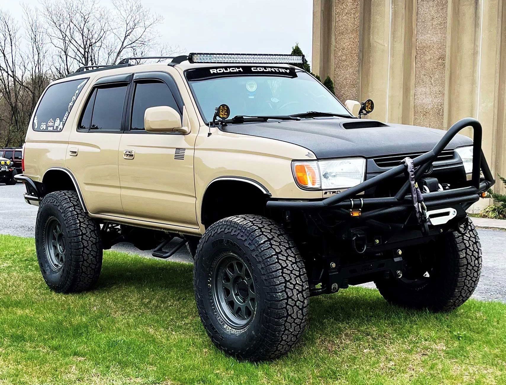 beige and black off-road vehicle