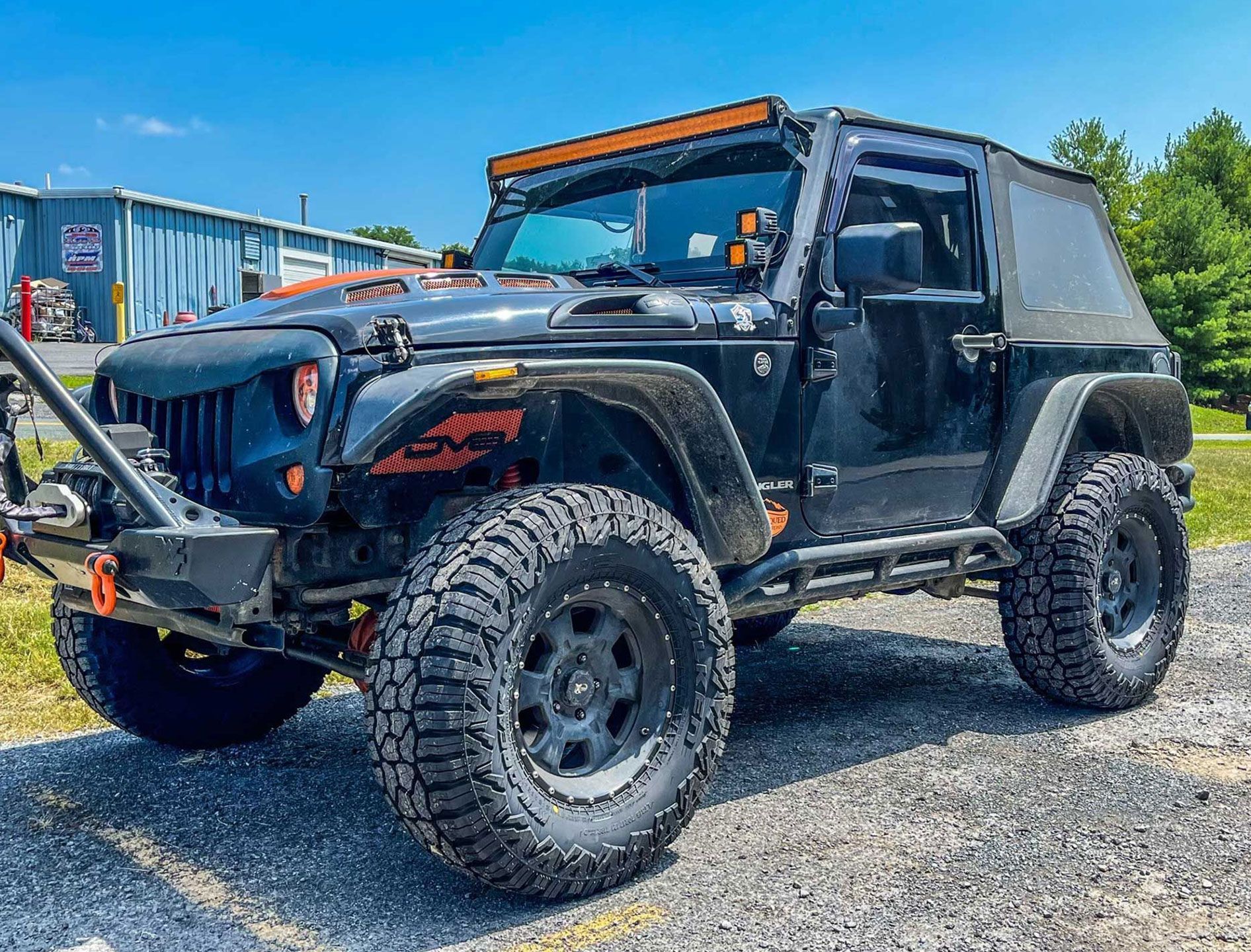 two-door jeep with a heavy-duty bumper