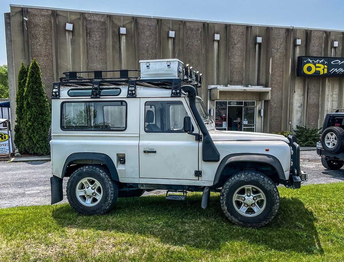 white two-door jeep