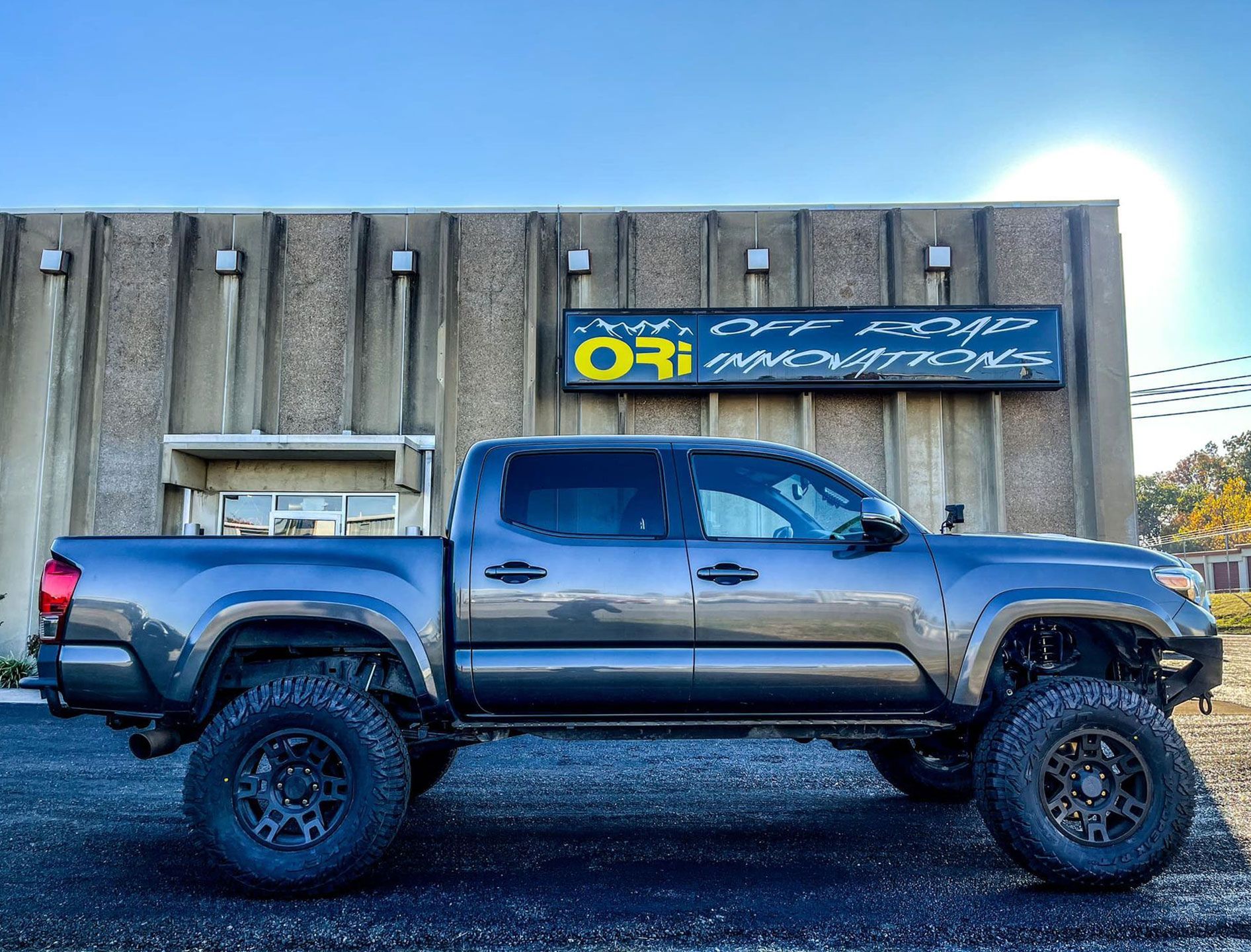 pickup truck in front of the shop