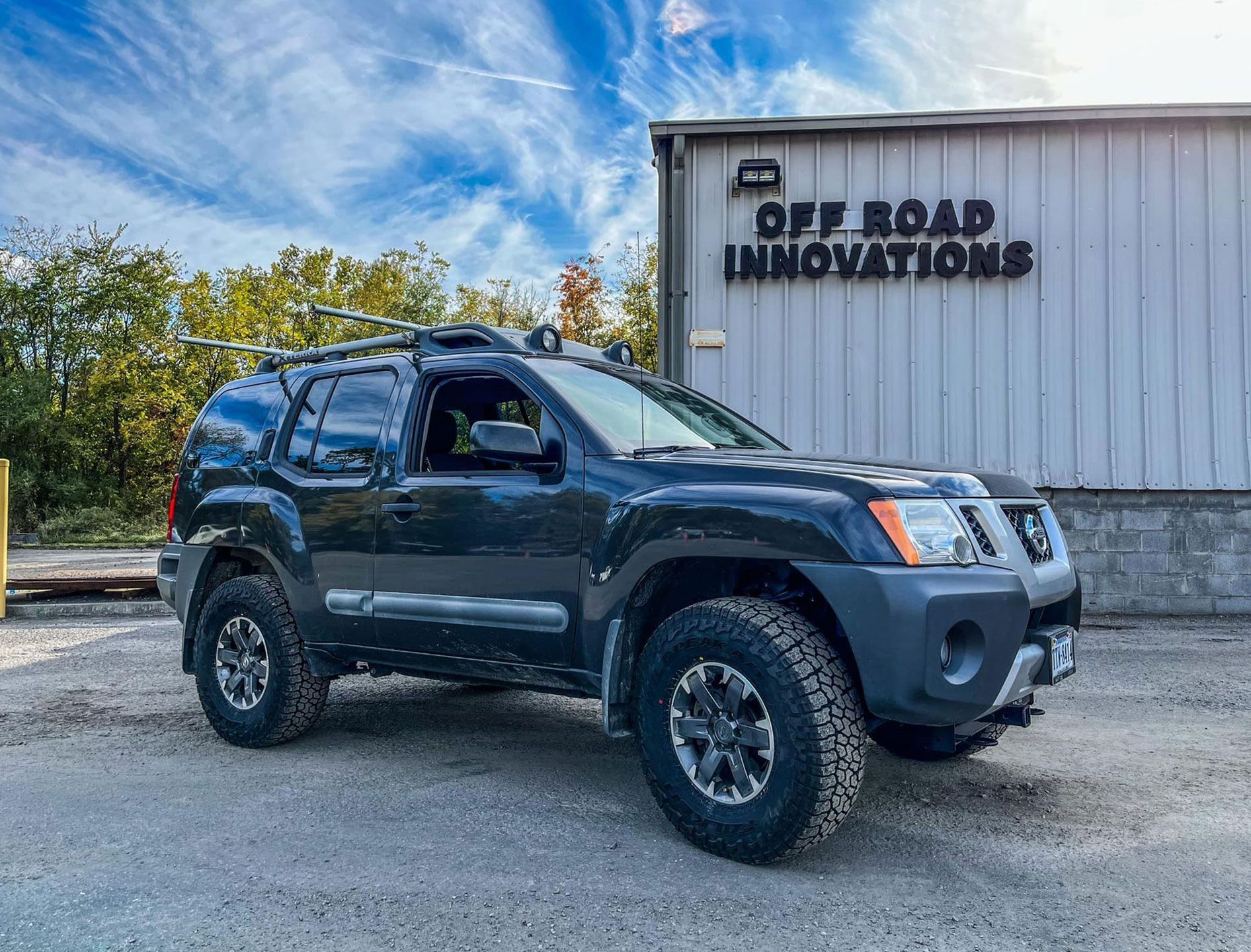 Nissan SUV outside garage