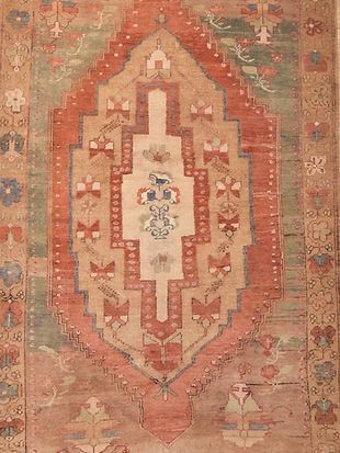 A close up of a rug with a geometric pattern on it.