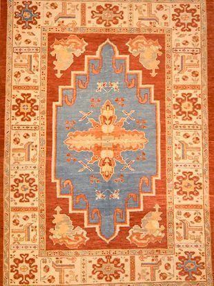 A rug with a blue and orange pattern on it
