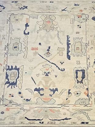 A close up of a rug with a pattern on it