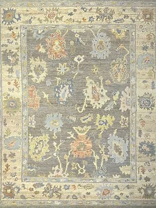 A rug with a floral pattern on it is sitting on a table.