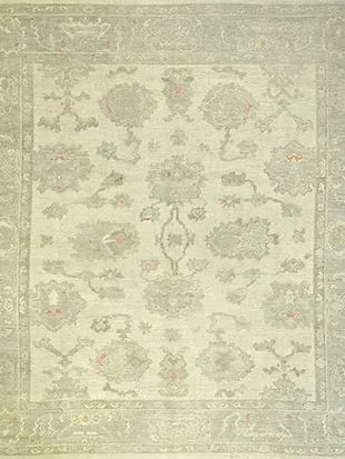 A close up of a rug with a floral pattern on it.