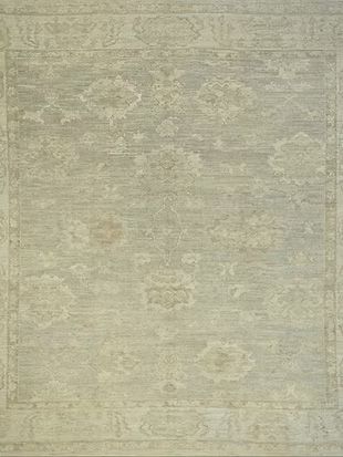 A close up of a rug with a floral pattern on it.