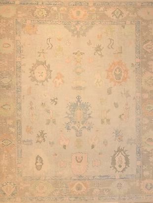 A close up of a rug with a floral pattern on it.