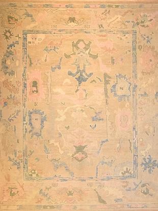 A close up of a rug with a floral pattern on it.